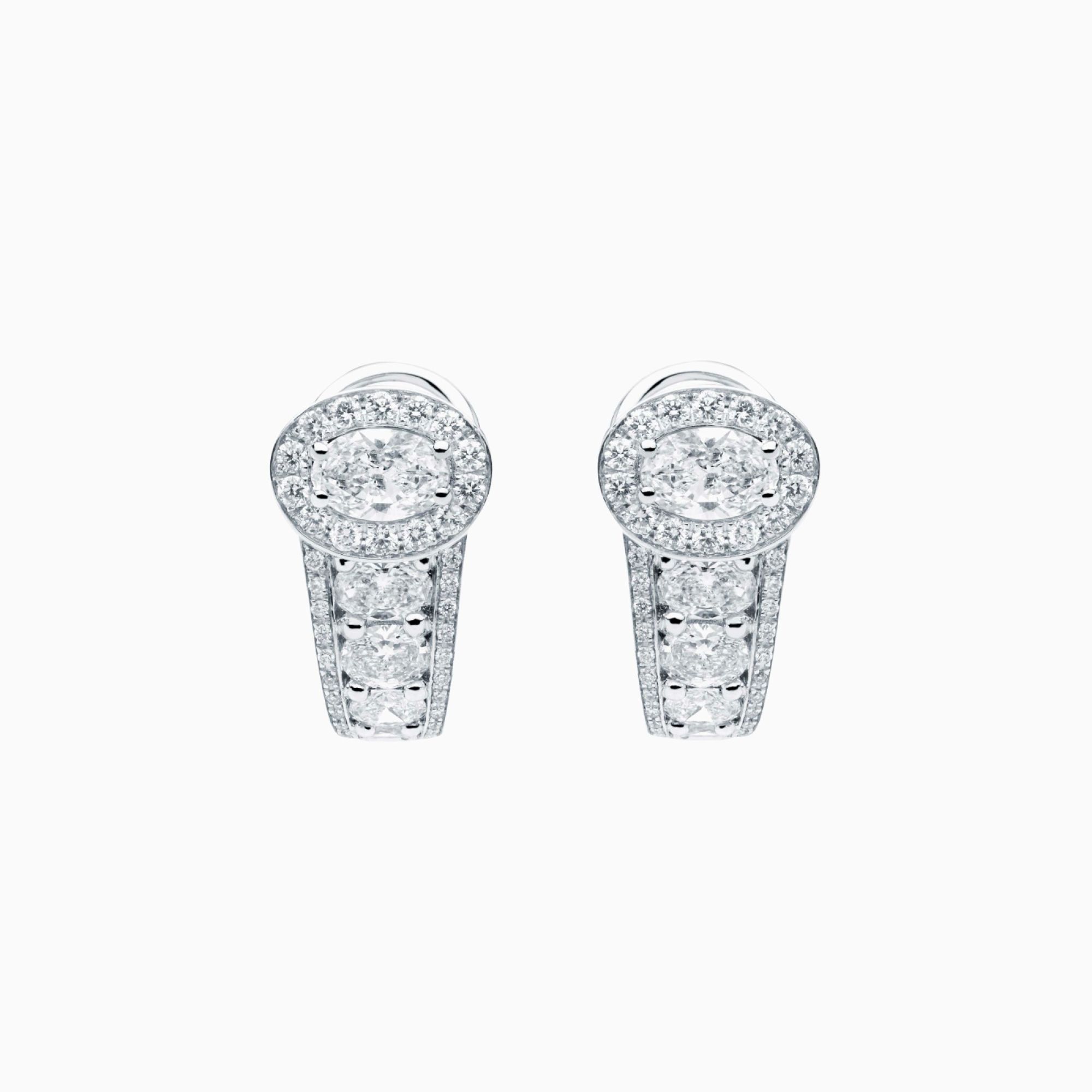 Pendientes de oro blanco con diamante central talla oval