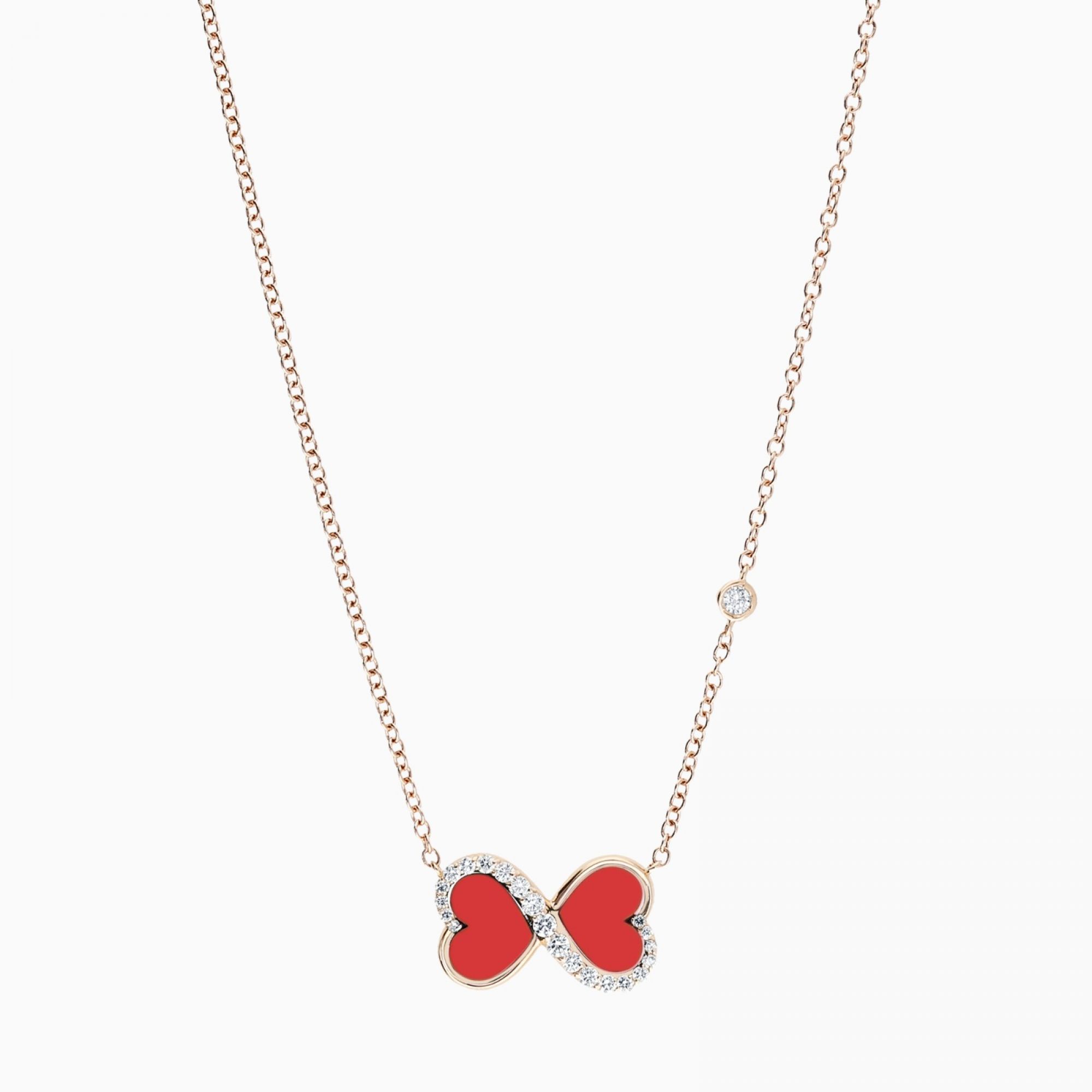 Colgante con símbolo infinito de oro rosa con coral y diamantes