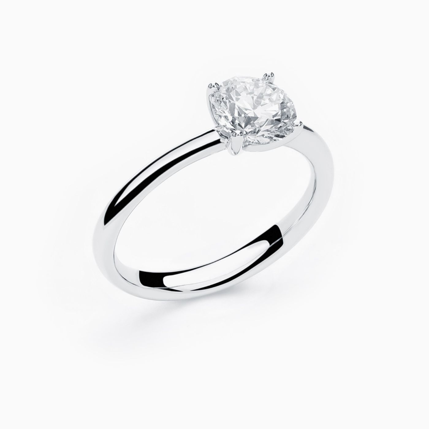 Anillo solitario de compromiso de oro blanco con diamante central