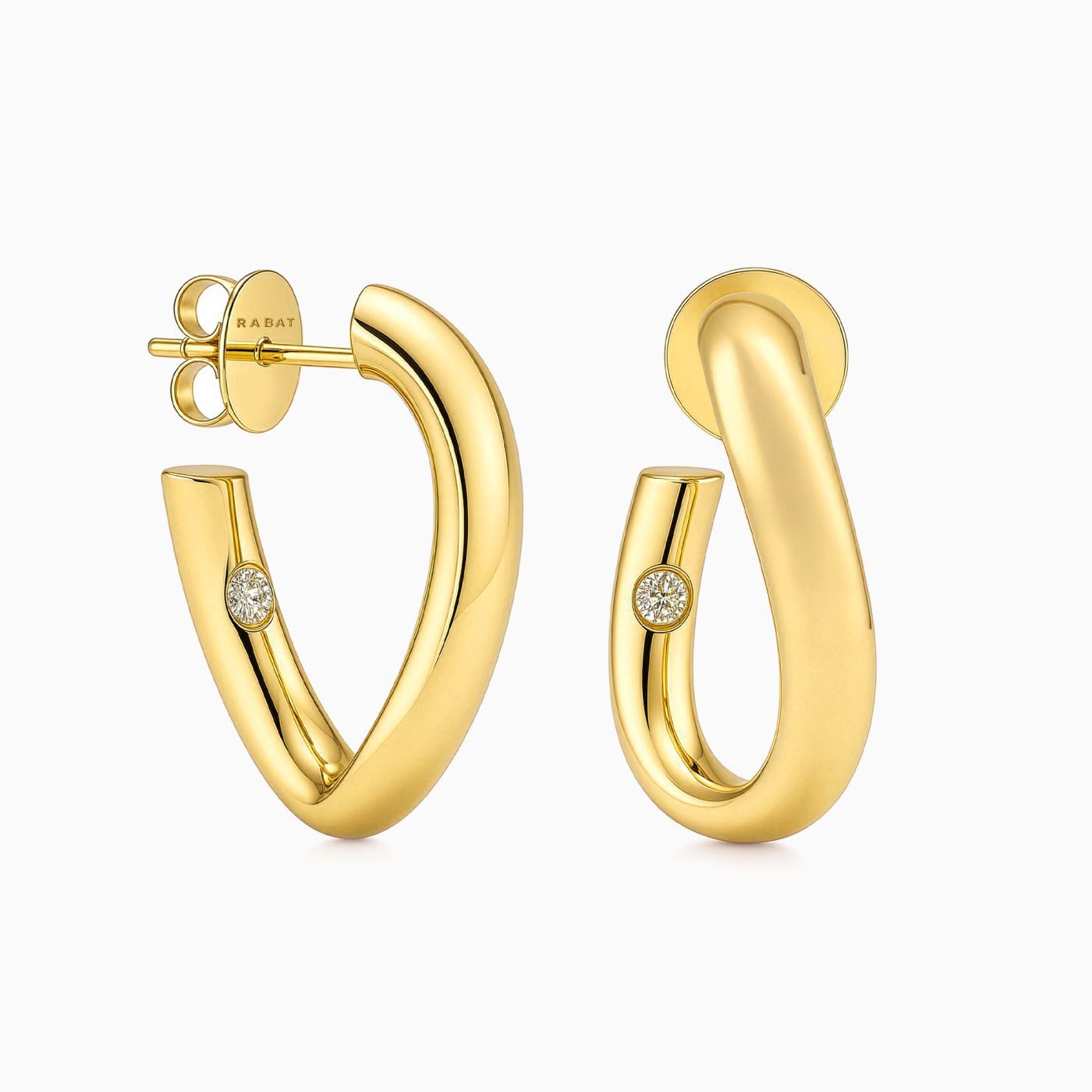 Pendientes de oro amarillo ondulados con diamante interior