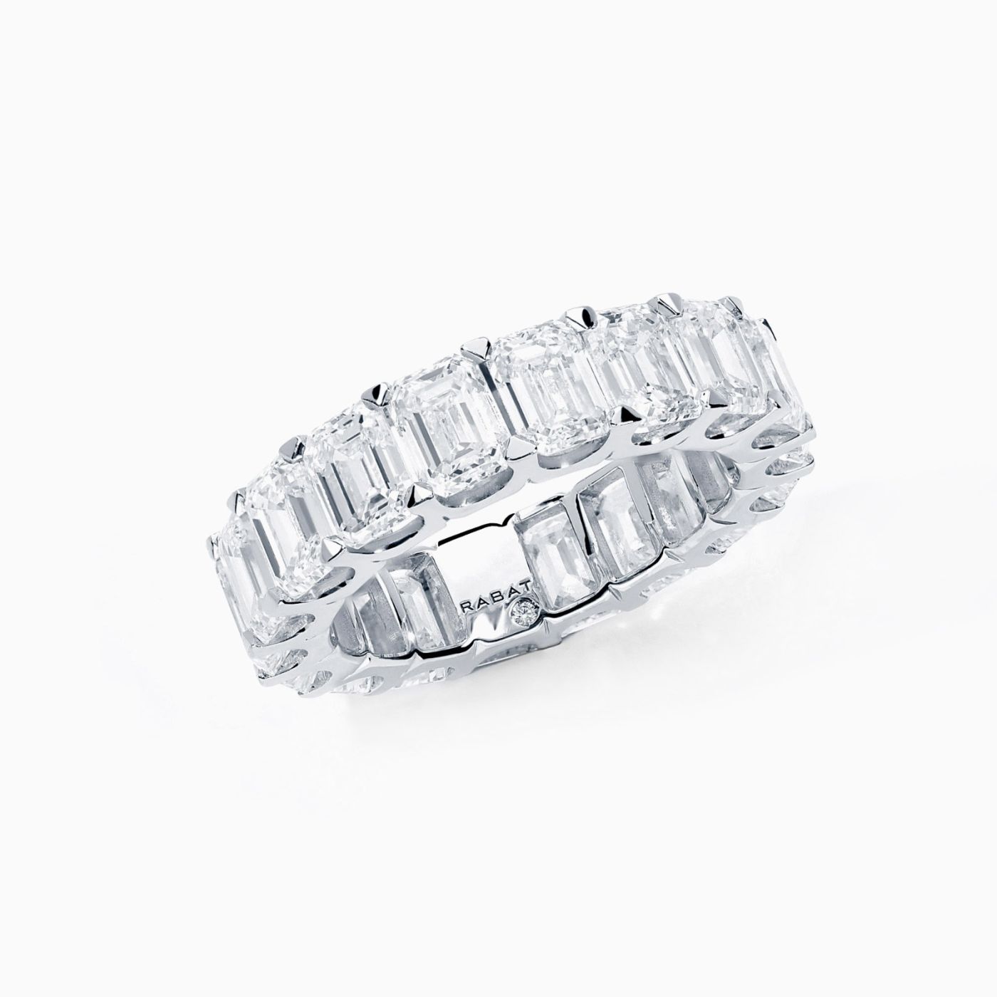 White gold wedding band with emerald-cut diamonds