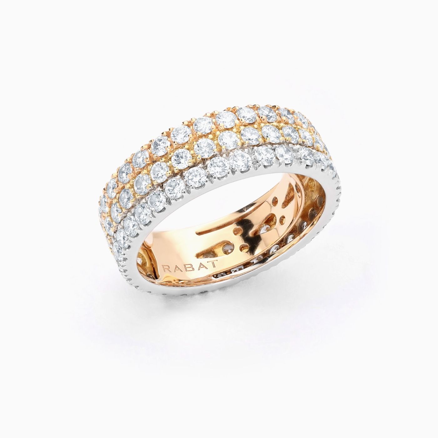 Three gold ring with rows of diamonds