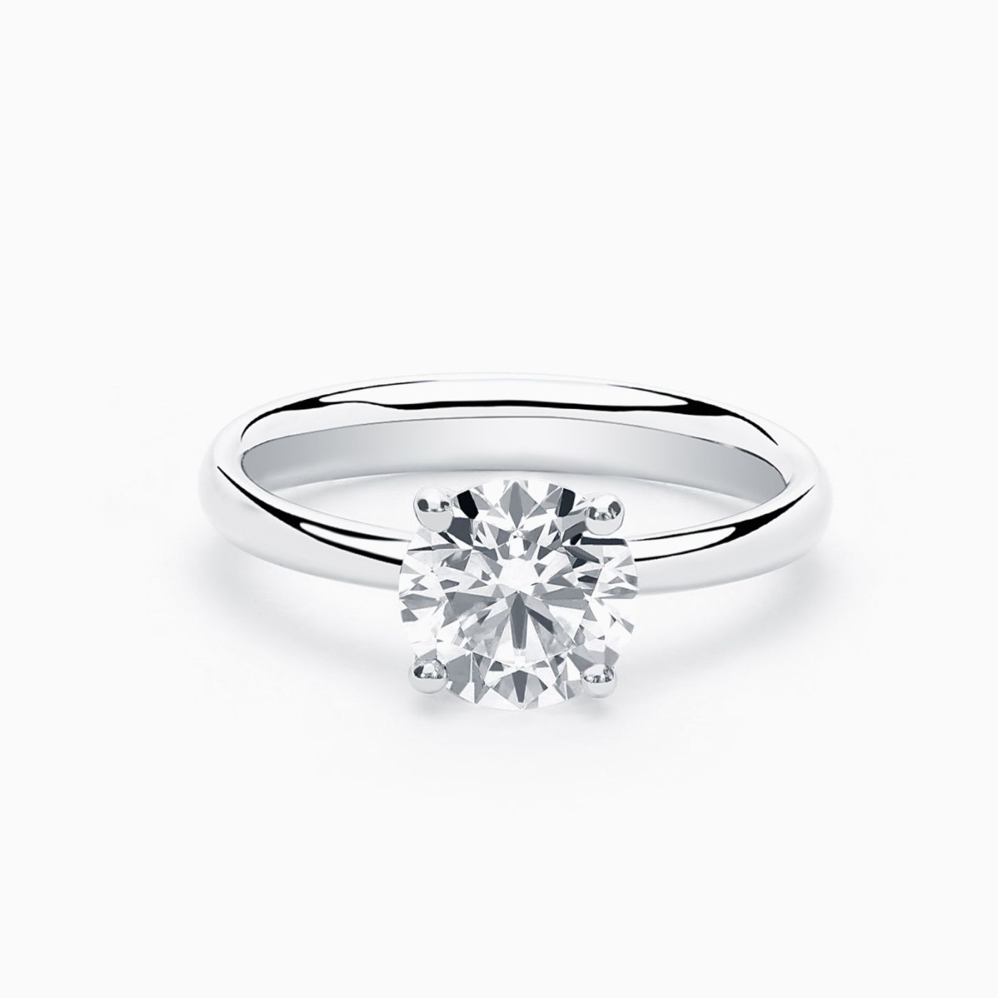 Anillo solitario de compromiso de oro blanco con diamante central 