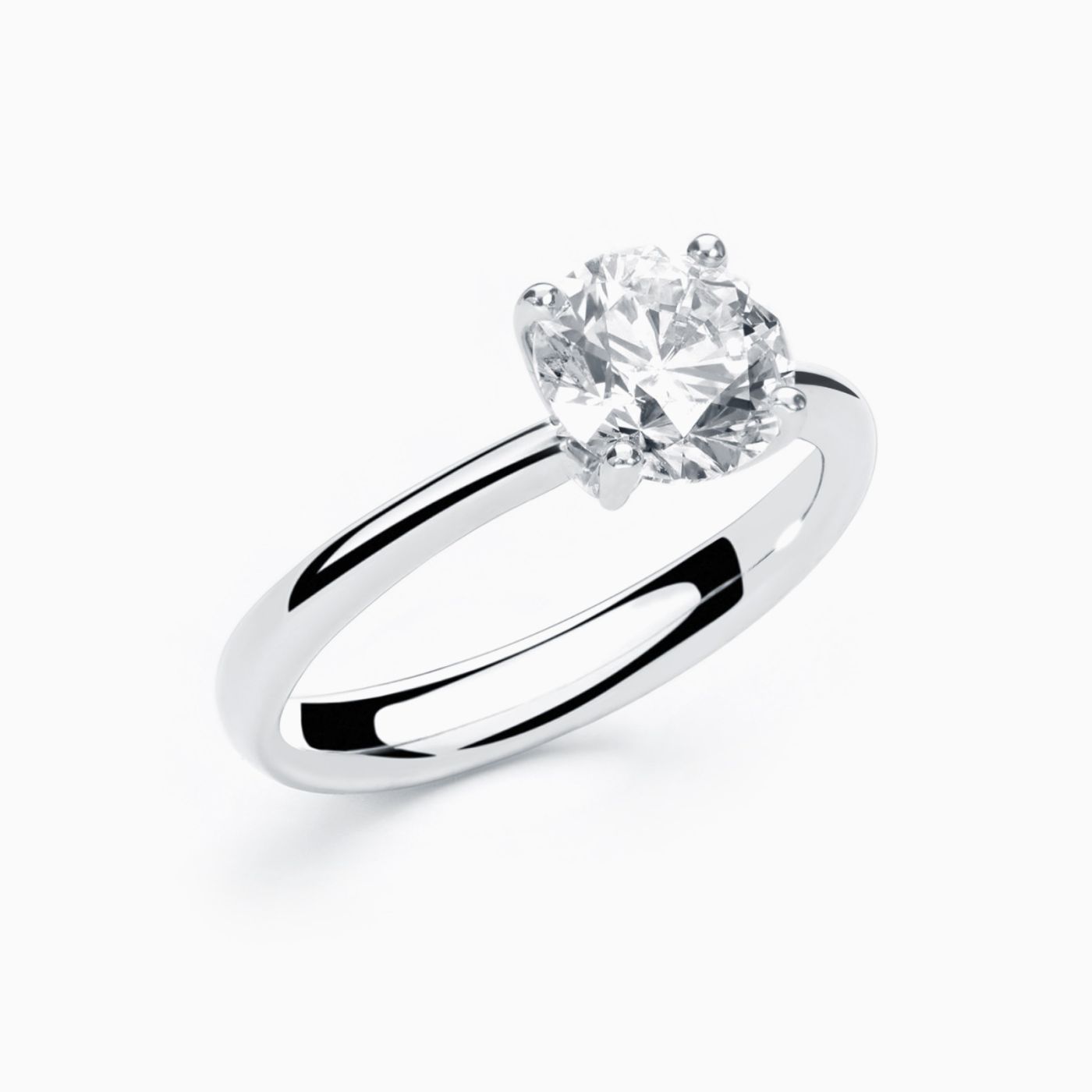 Anillo solitario de compromiso de oro blanco con diamante central 