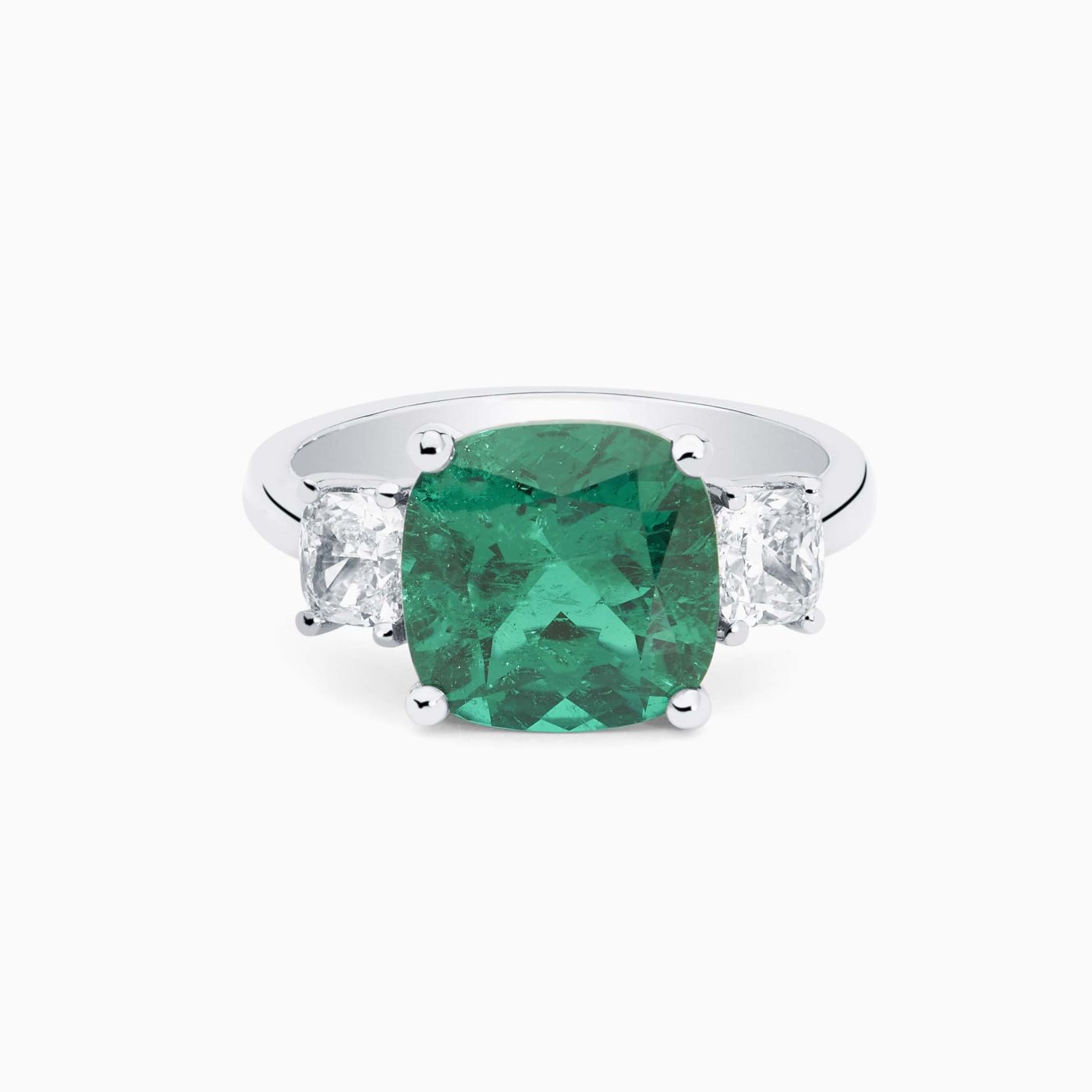 White gold with emerald in the center solitaire ring