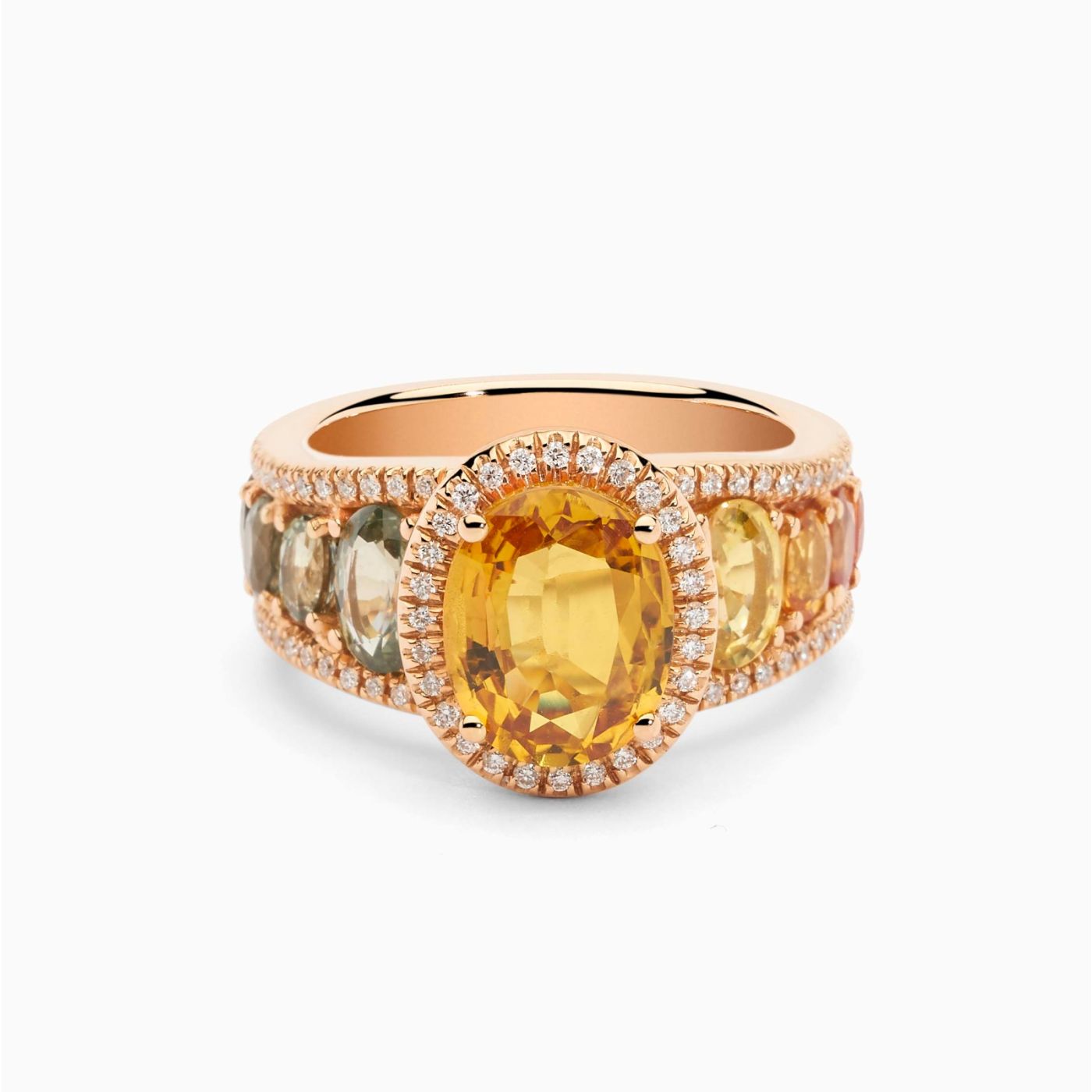 Solitaire ring in rose gold with a central yellow sapphire and a multicoloured sapphire band