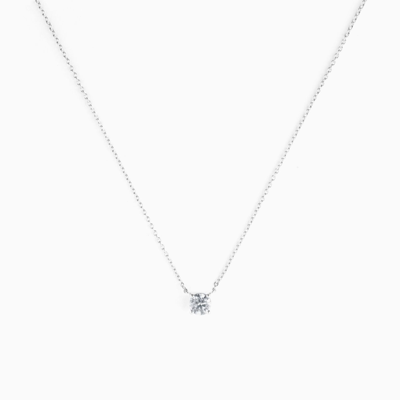 Colgante solitario de oro blanco con diamante