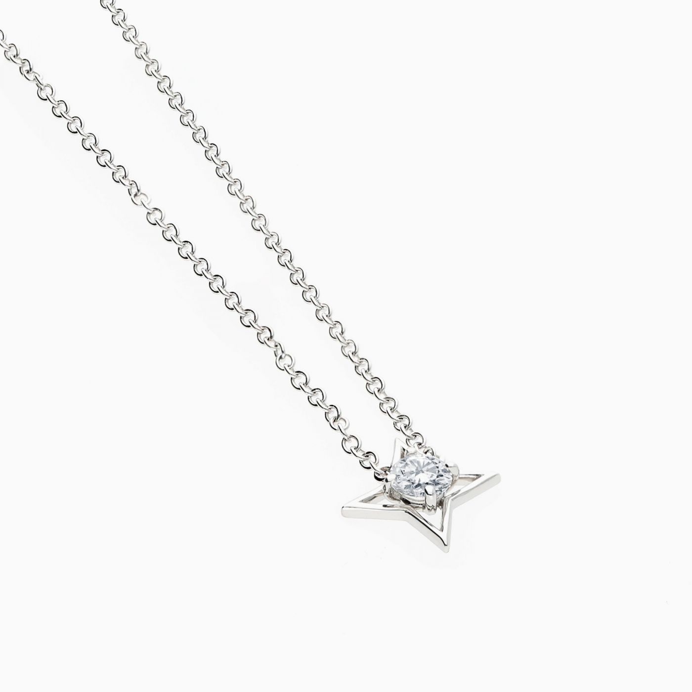 Colgante solitario estrella de oro blanco con diamante 