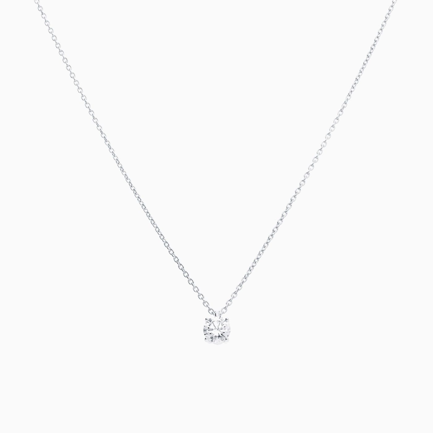 Colgante solitario de oro blanco con diamante central