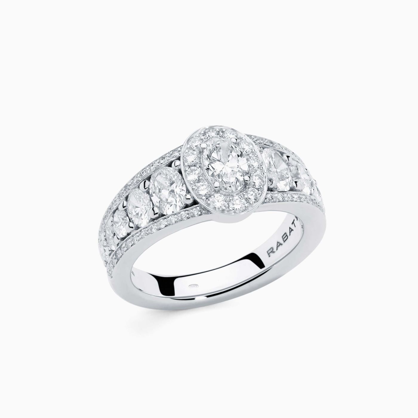 White gold with an oval diamond in the center ring