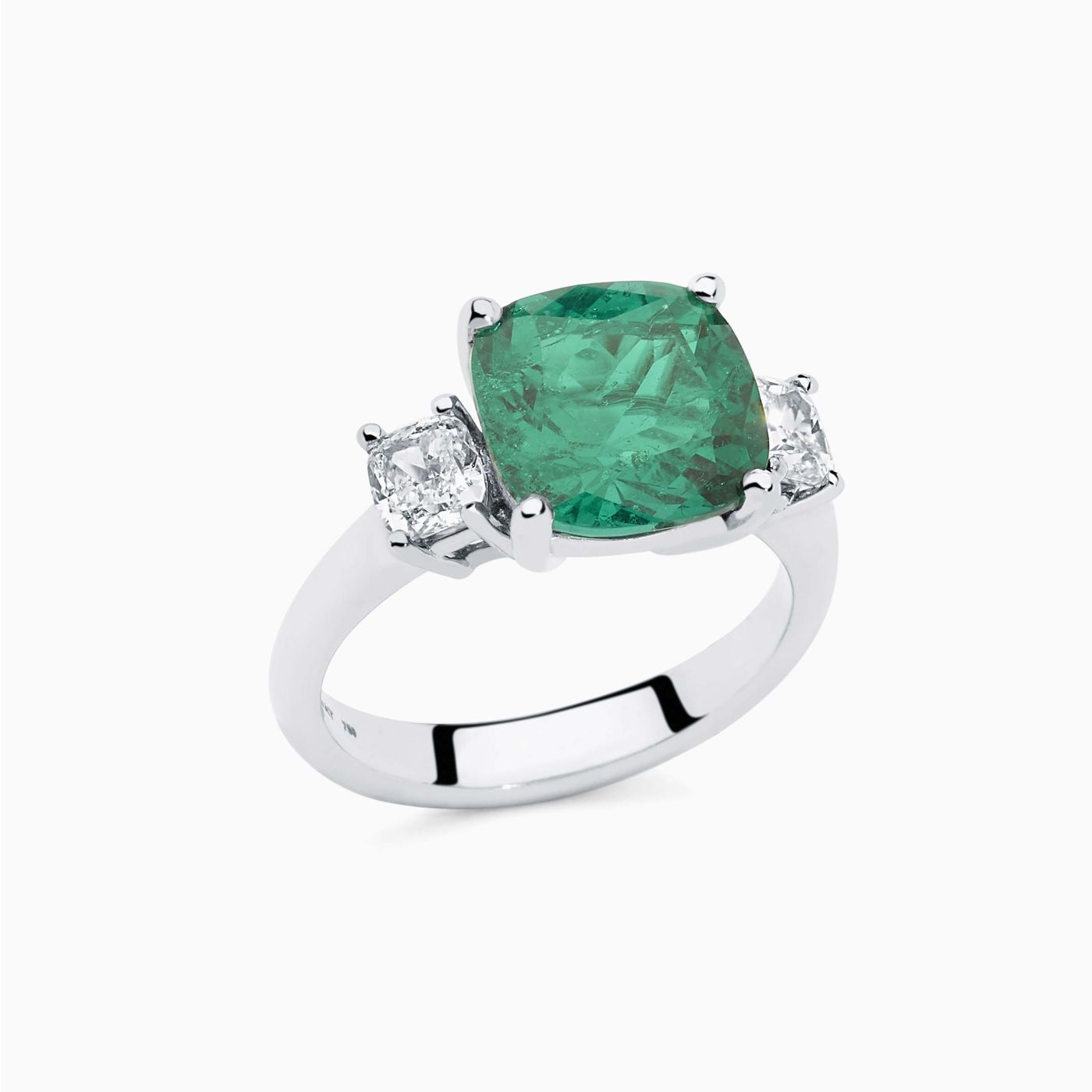 White gold with emerald in the center solitaire ring