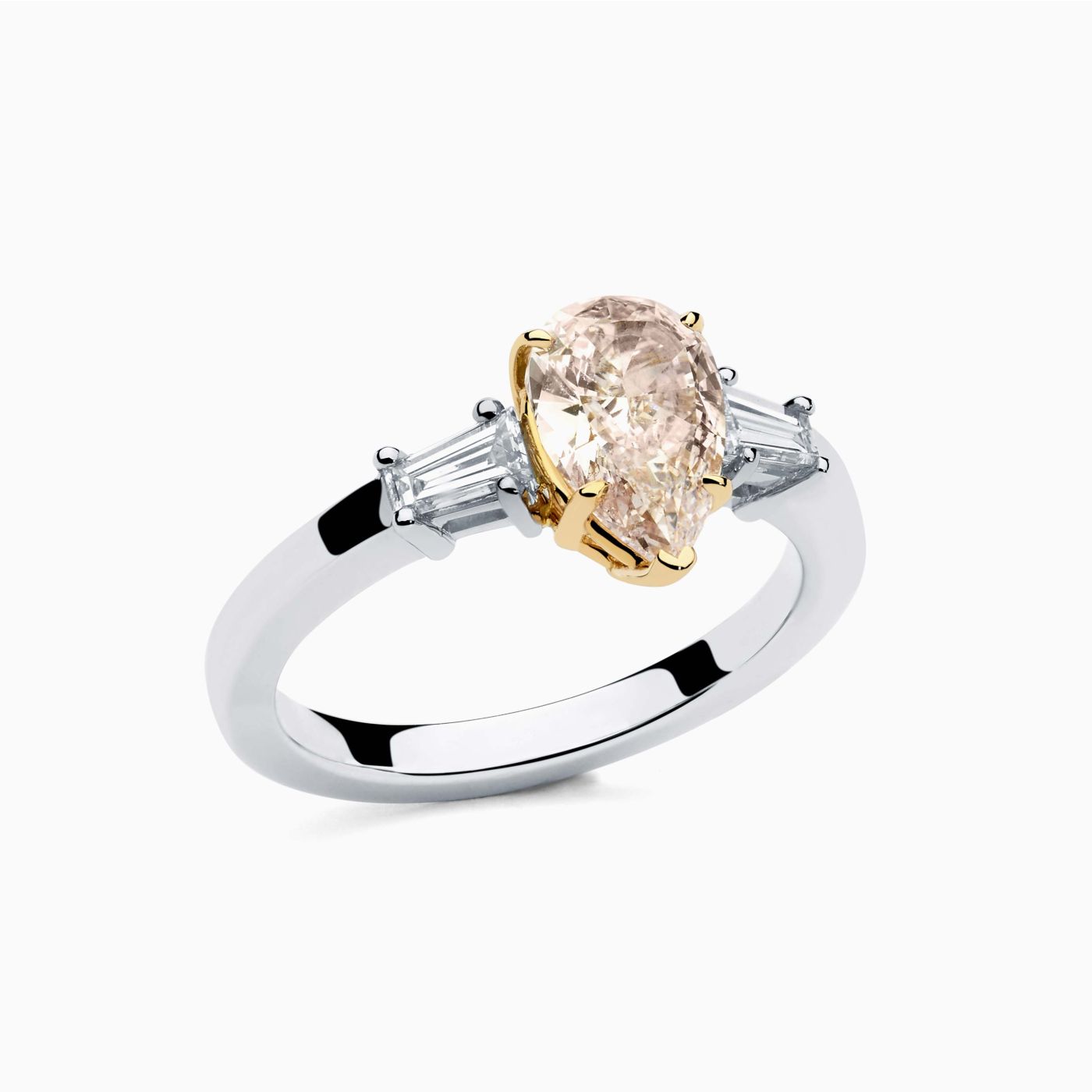 Platinum with pink fancy diamond in the center solitaire ring