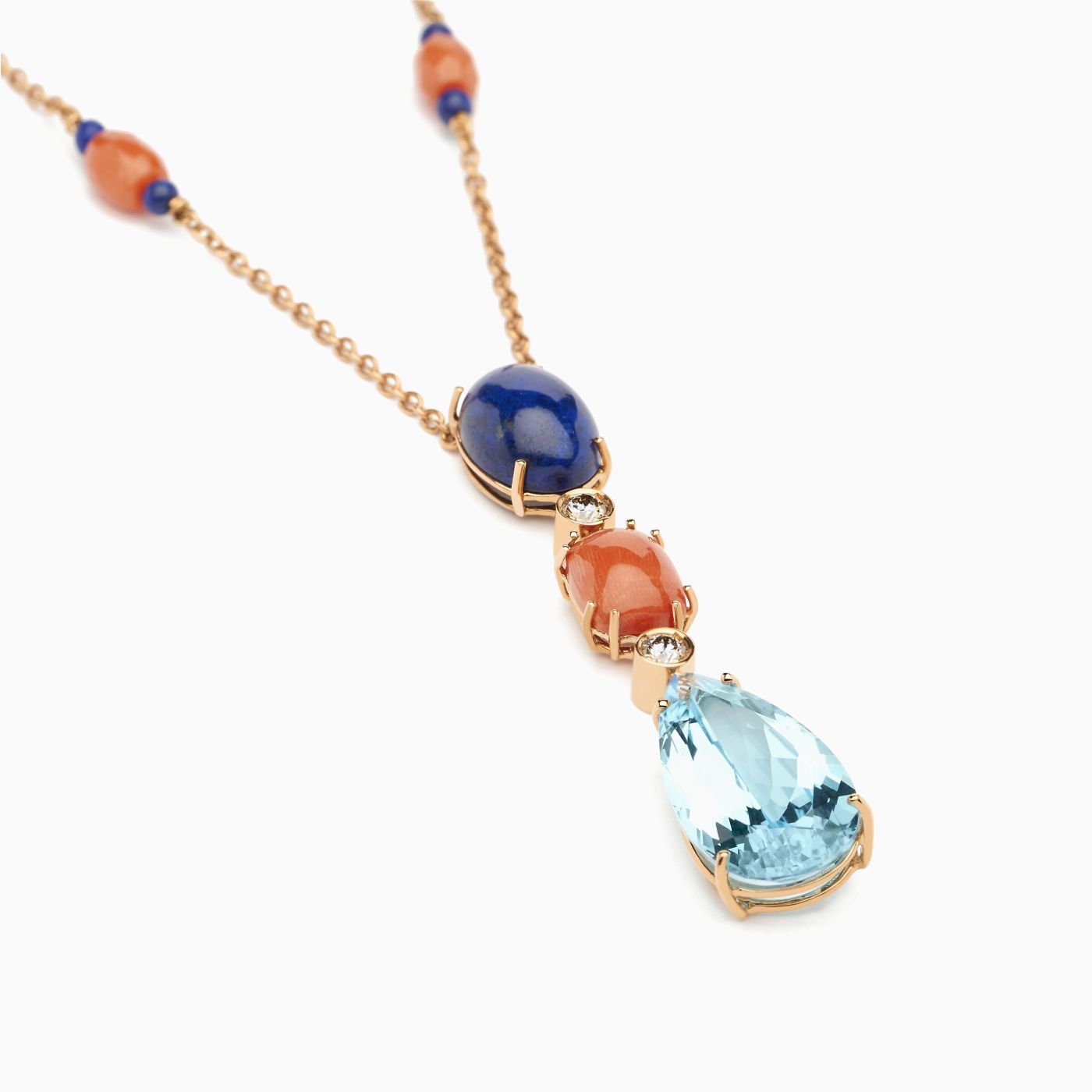 Collar  de oro rosa con gemas coral, lapis lazuli, topacio azul y diamantes