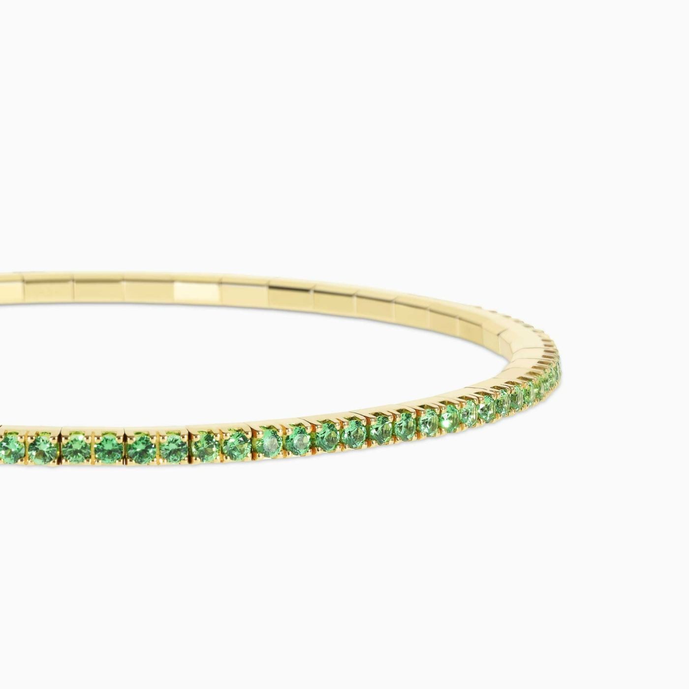 Yellow gold riviere bracelet with brilliant-cut tsavorites