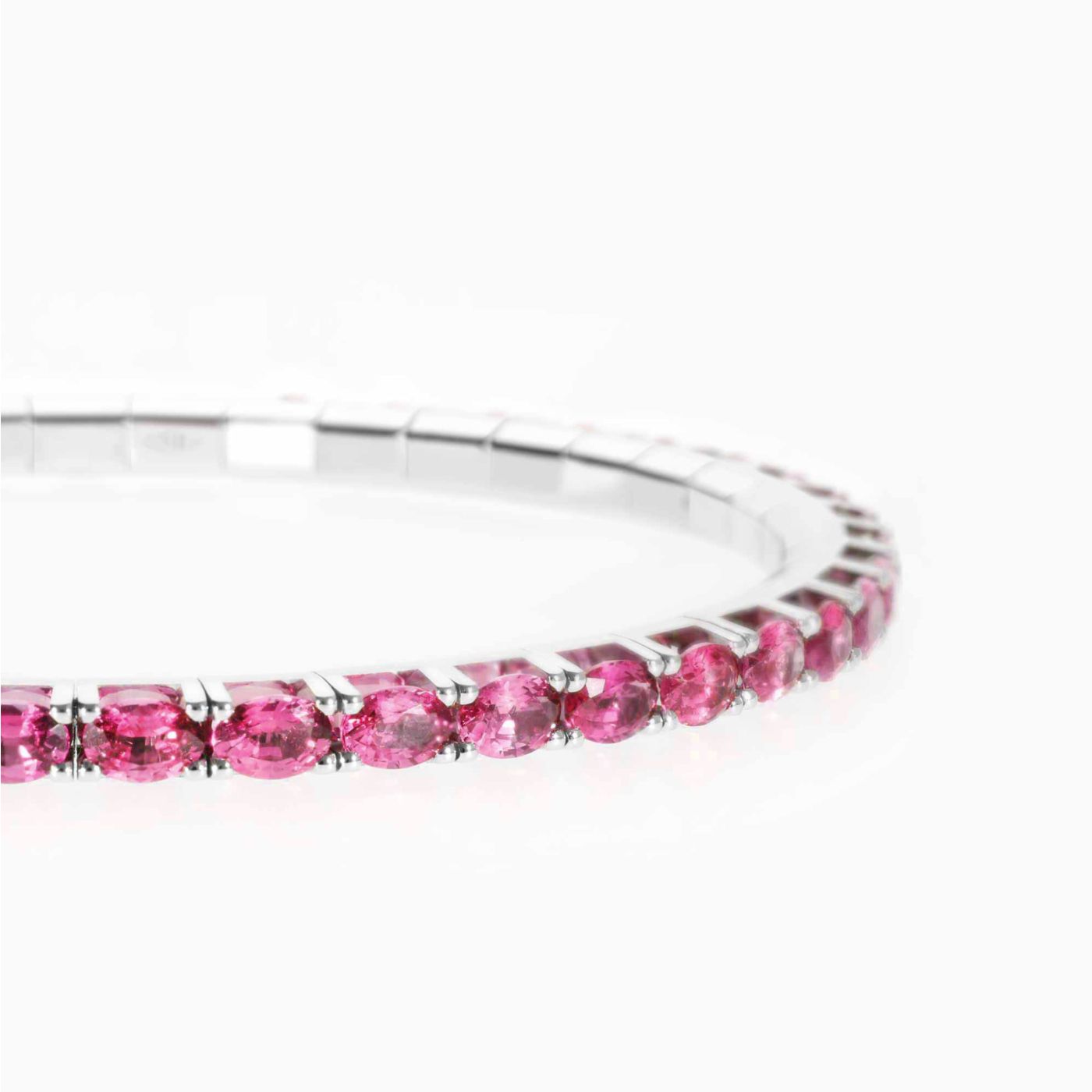 Elastic riviere bracelet in rose gold with red rubies