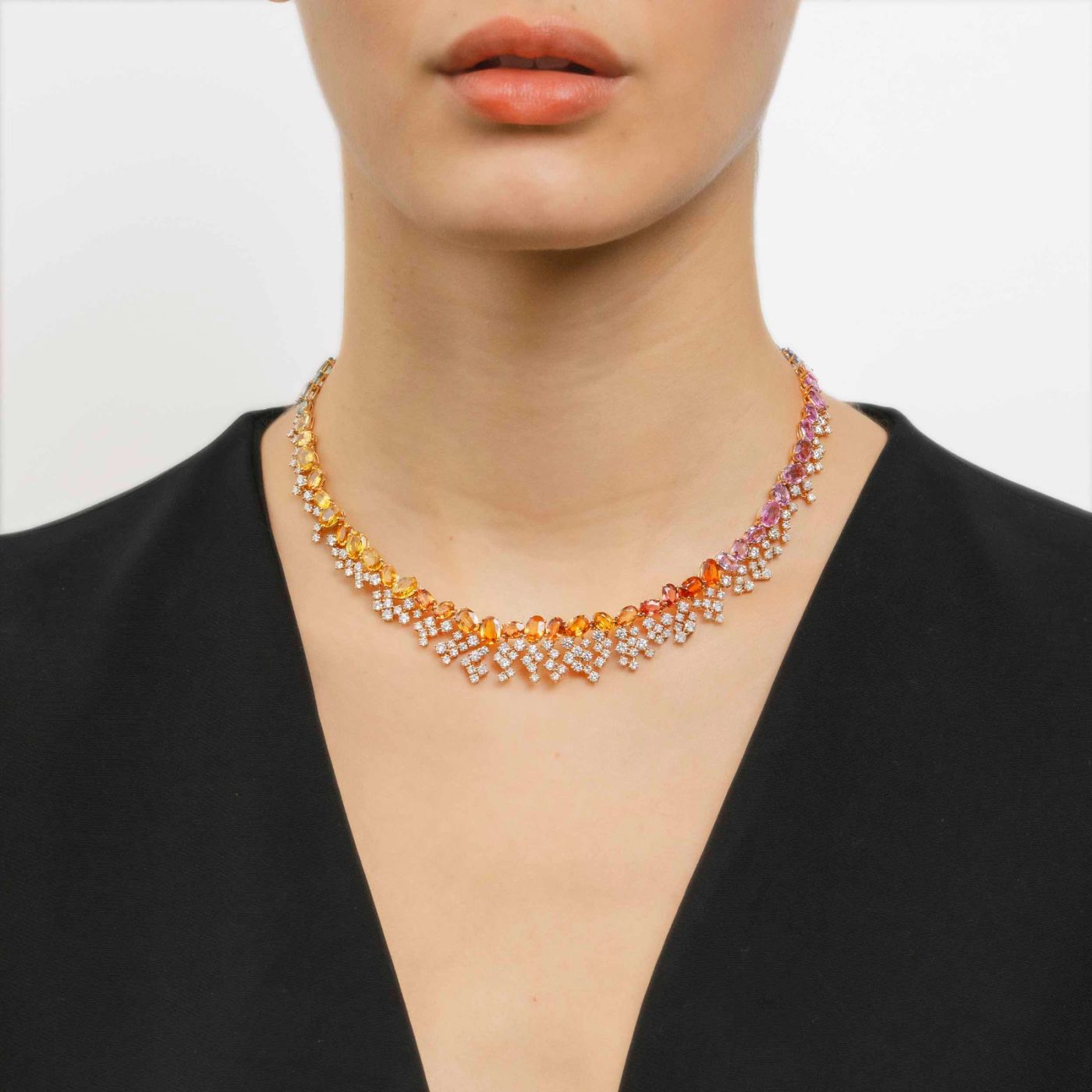 Rose gold necklace with cascading diamonds and multicoloured sapphires
