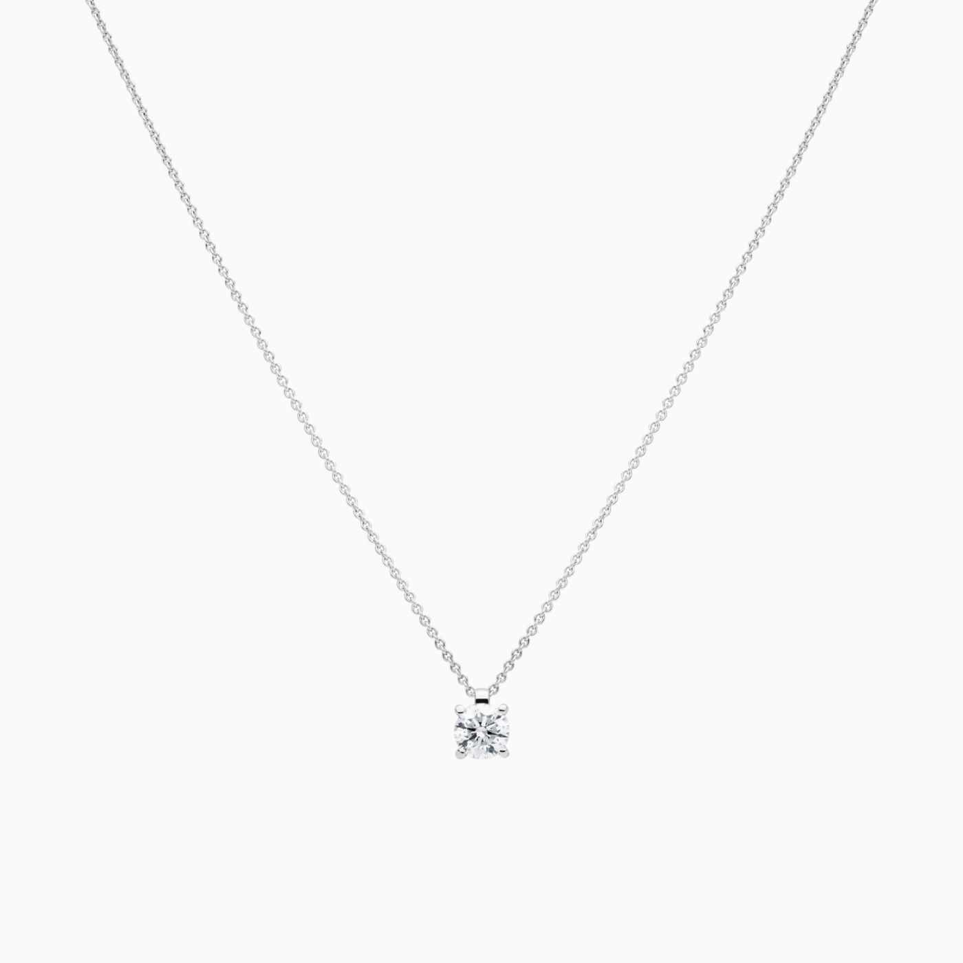 Colgante solitario de oro blanco con diamante central