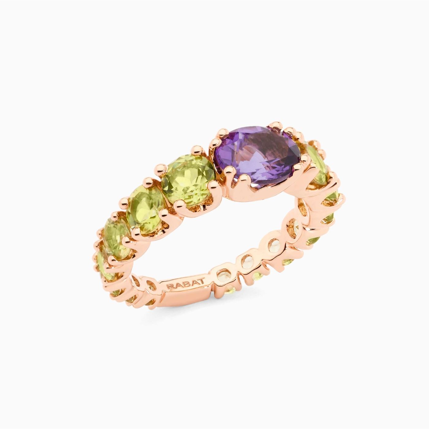 Rose gold ring with central amethyst and peridota arm