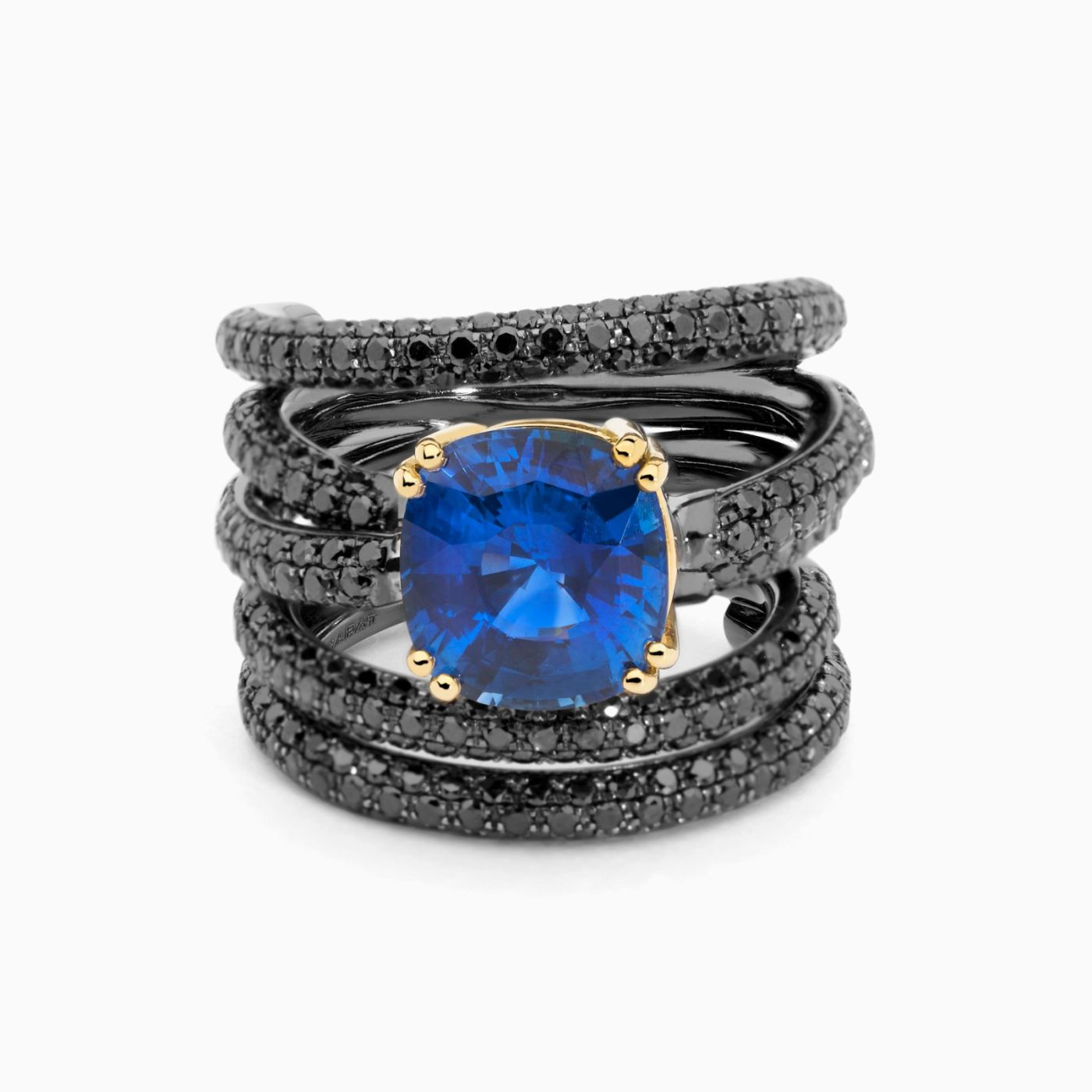 White gold with emeral in the blue sapphire and arm with black diamonds solitaire ring