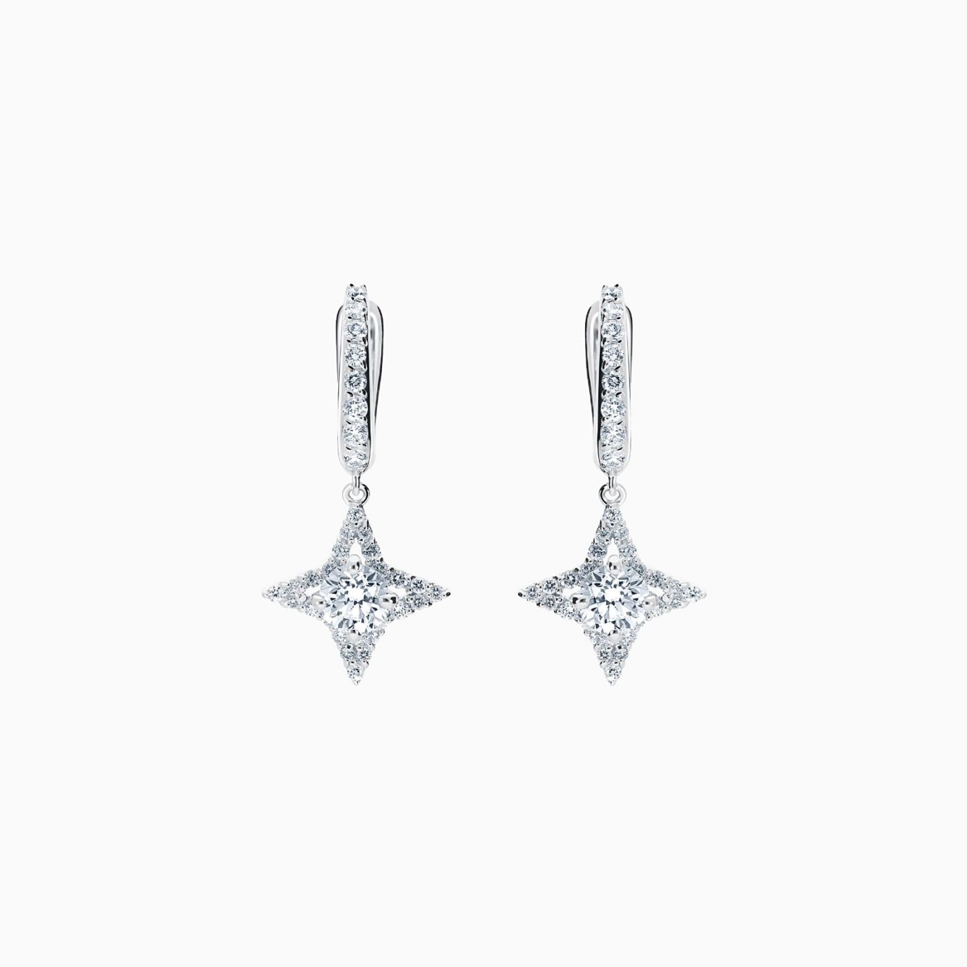 Pendientes estrella de oro blanco con diamante central y orla de diamantes 