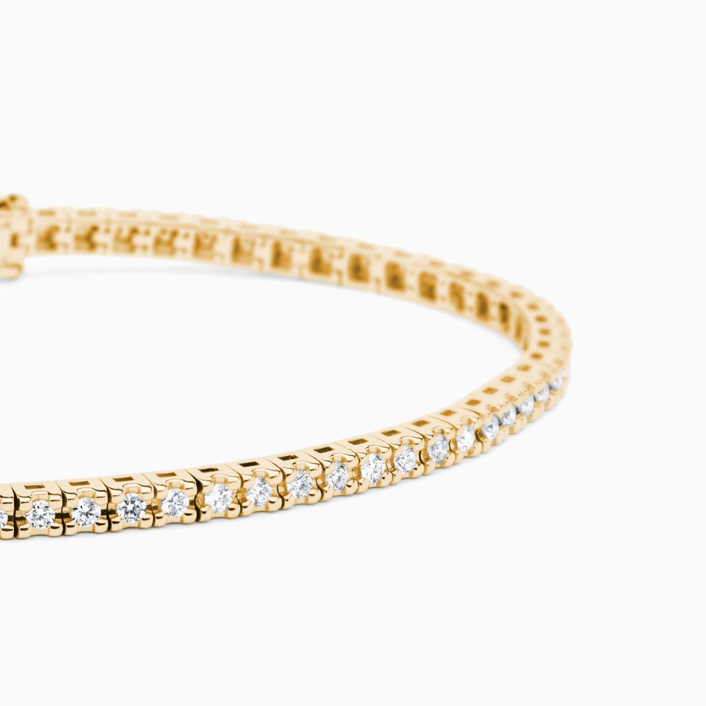 Yellow gold riviere bracelet with diamonds