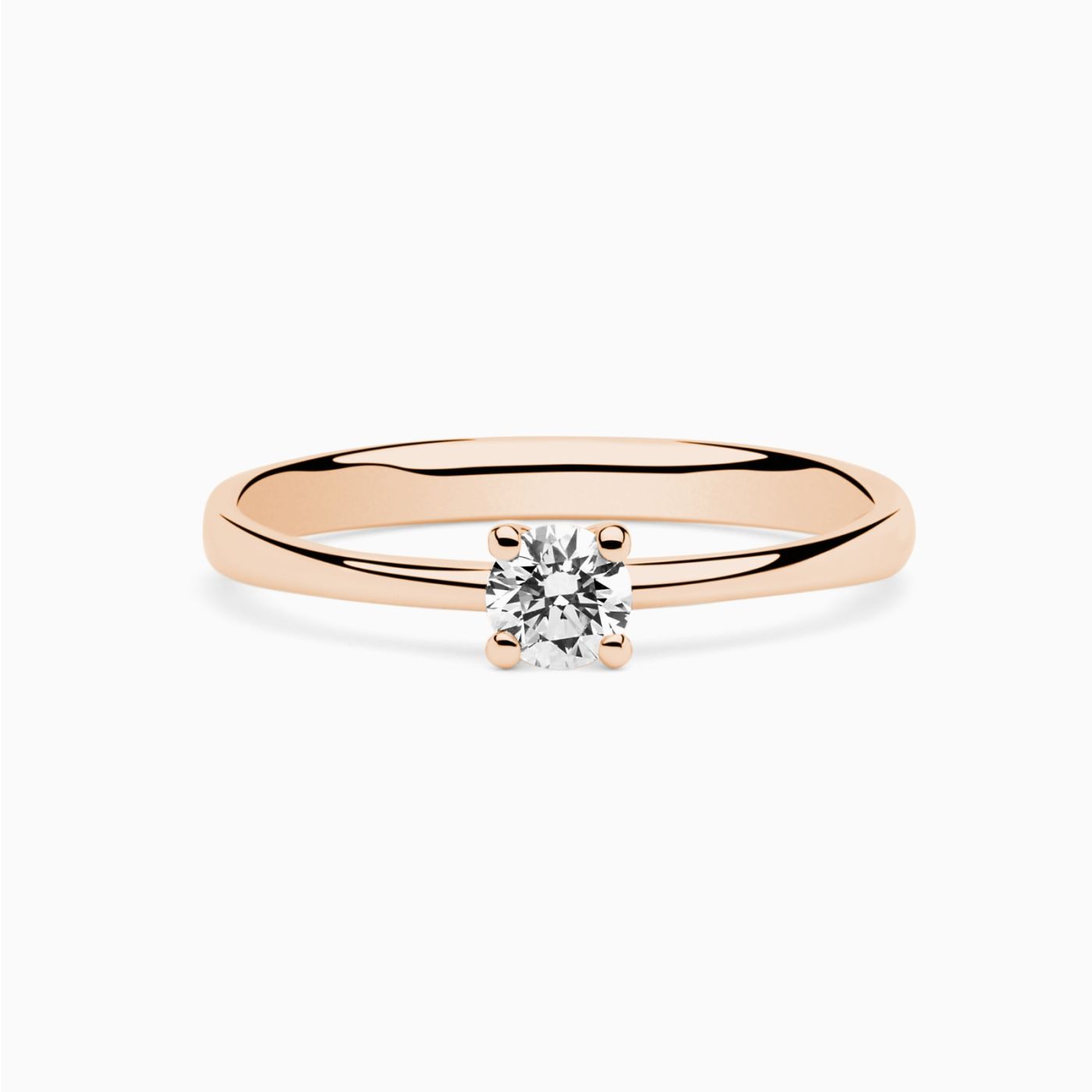 Rose gold engagement ring with central diamond