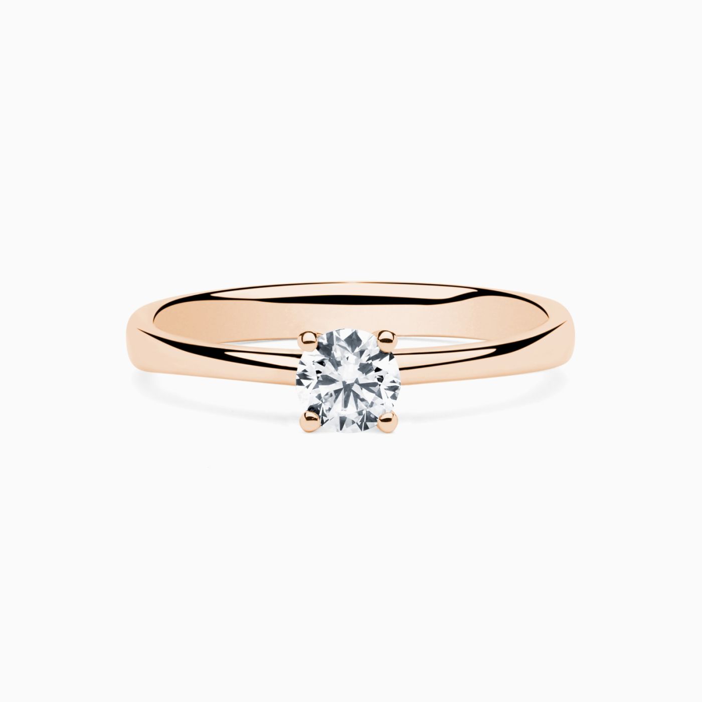Rose gold engagement ring with central diamond