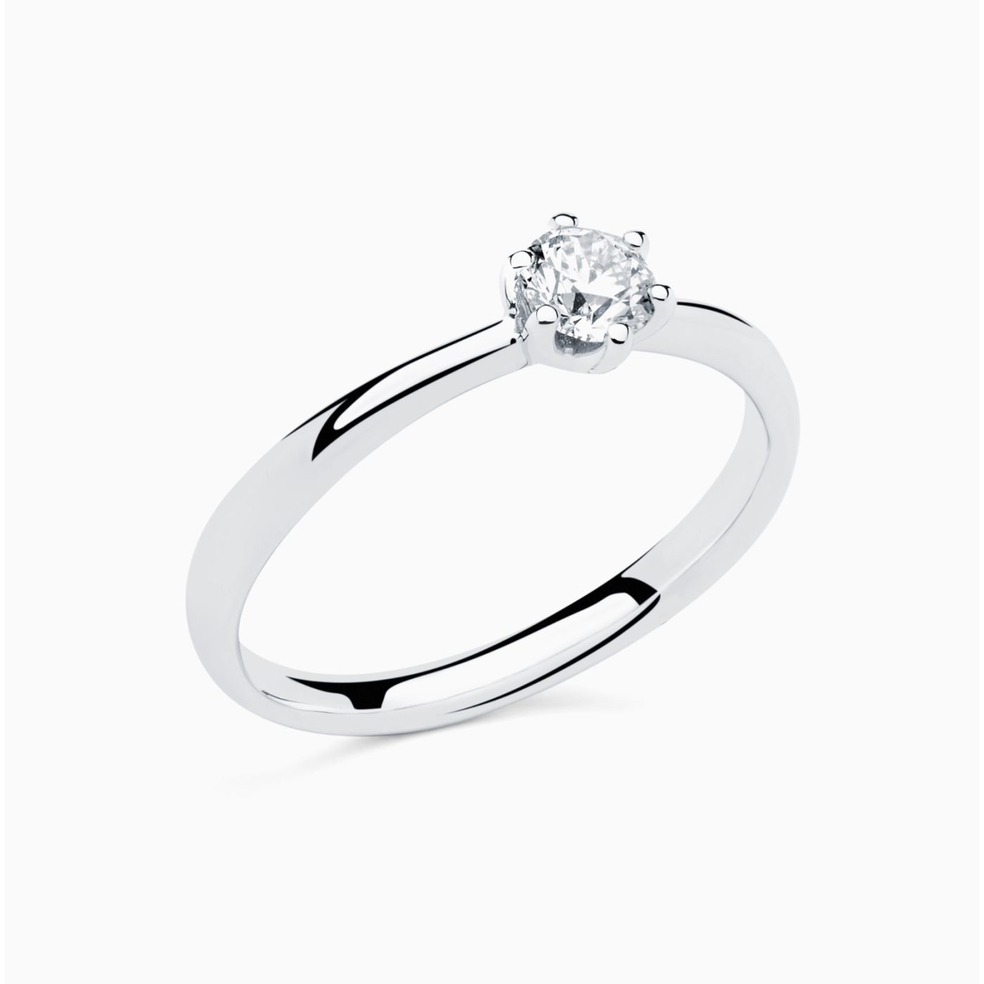 White gold solitaire engagement ring with a central diamond