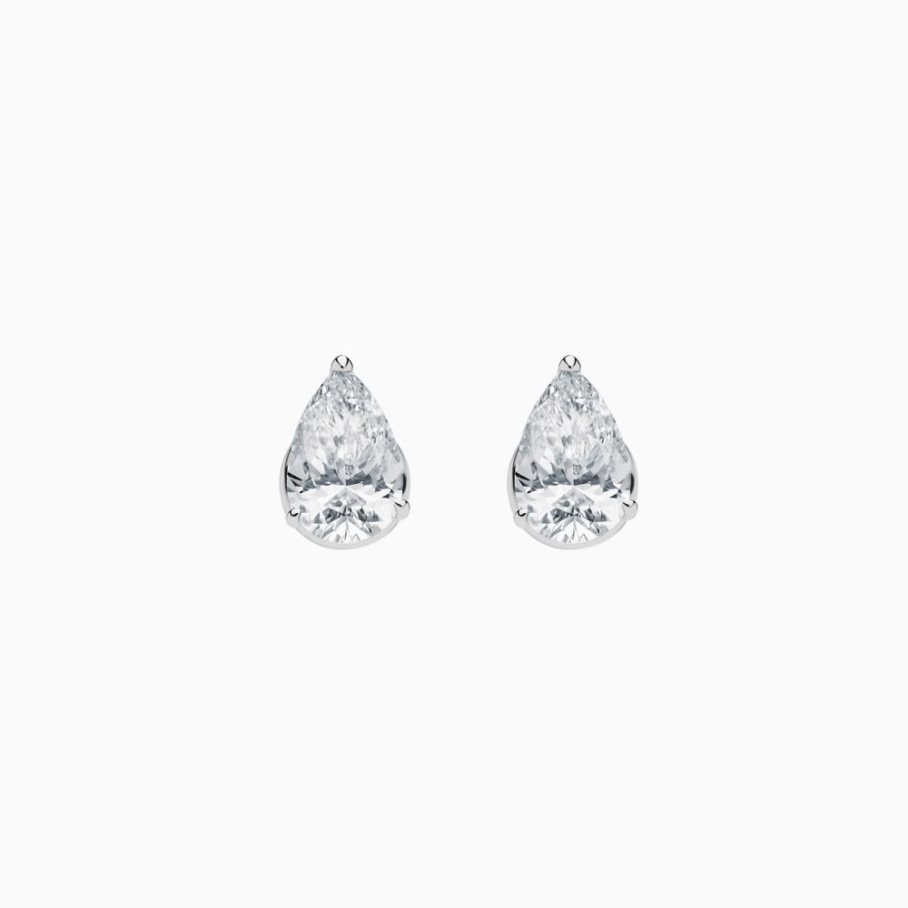 Pendientes dormilonas de oro blanco con diamantes talla pera