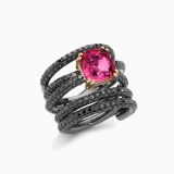White gold with ruby in red and arm with black diamonds solitaire ring