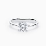 White gold solitaire engagement ring with central diamond