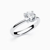 Anillo solitario de compromiso de oro blanco con diamante central 