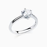 White gold solitaire engagement ring with a central diamond