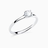 White gold solitaire engagement ring with a central diamond