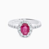 White gold with a ruby in the center solitaire ring