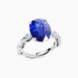 White gold with central marquise cut blue sapphire ring