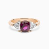 Rose gold with ruby in the center solitaire ring