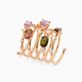 Anillo tubogas  de oro rosa con gemas naturales