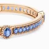 Rose gold cuff bracelet with blue sapphires