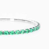 White gold riviere bracelet with oval cut tsavorites
