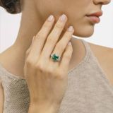 White gold with emerald in the center solitaire ring