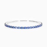 White gold riviere bracelet with oval cut sapphires
