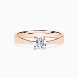Rose gold engagament ring with central diamond