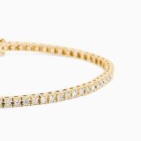 Yellow gold riviere bracelet with diamonds