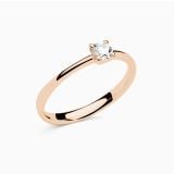 Rose gold engagement ring with central diamond