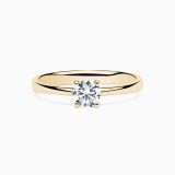 Yellow gold engagement ring with central diamond