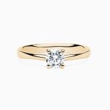 Yellow gold engagement ring with central diamond
