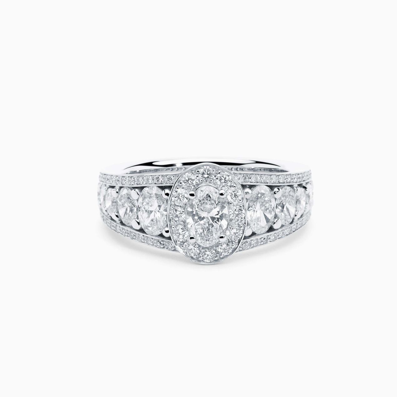 White gold with an oval diamond in the center ring
