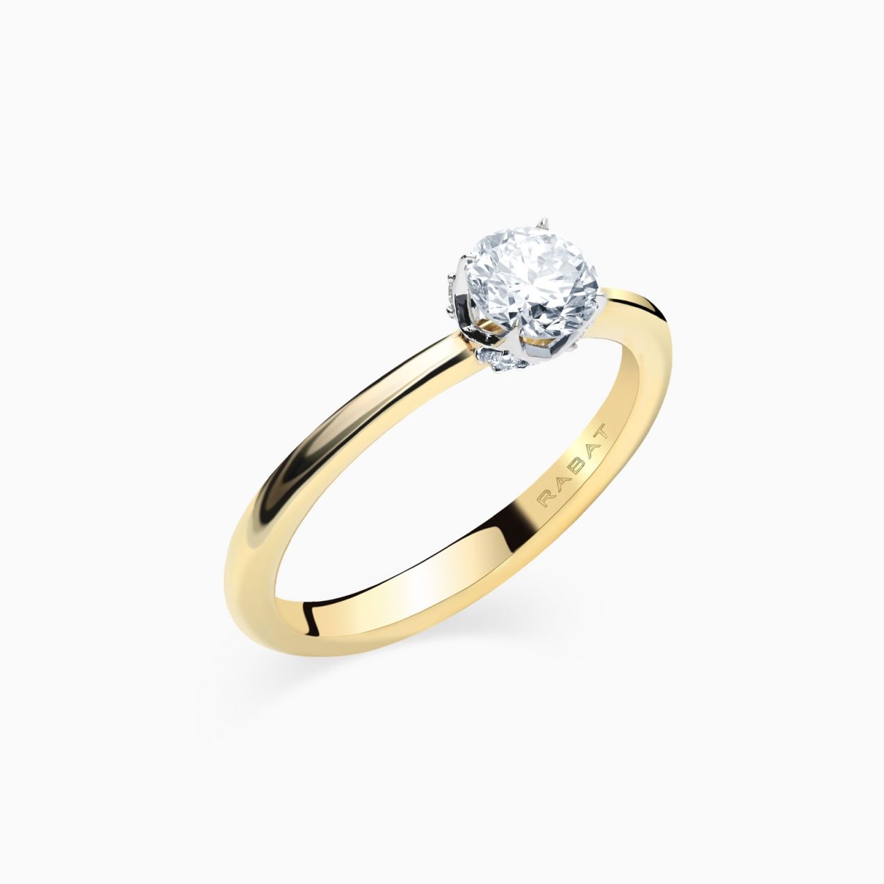 Solitaire ring in yellow gold with central diamond and mini diamonds