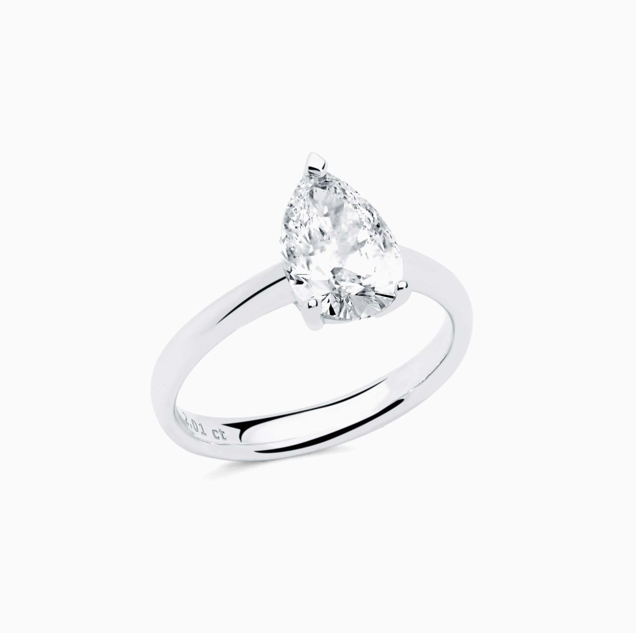 White gold with pear size diamond in the center solitaire ring
